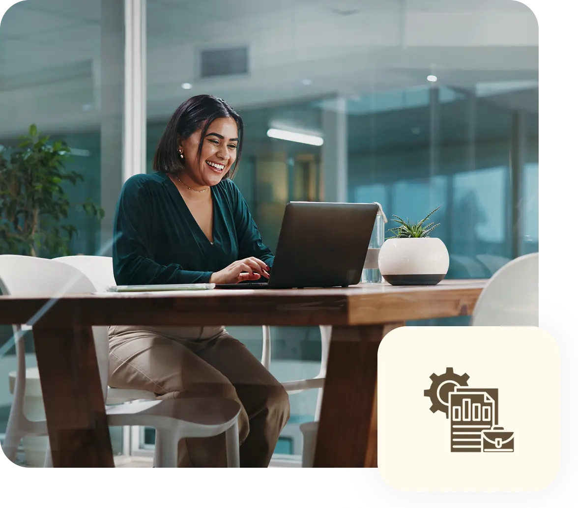 Woman working on laptop at desk