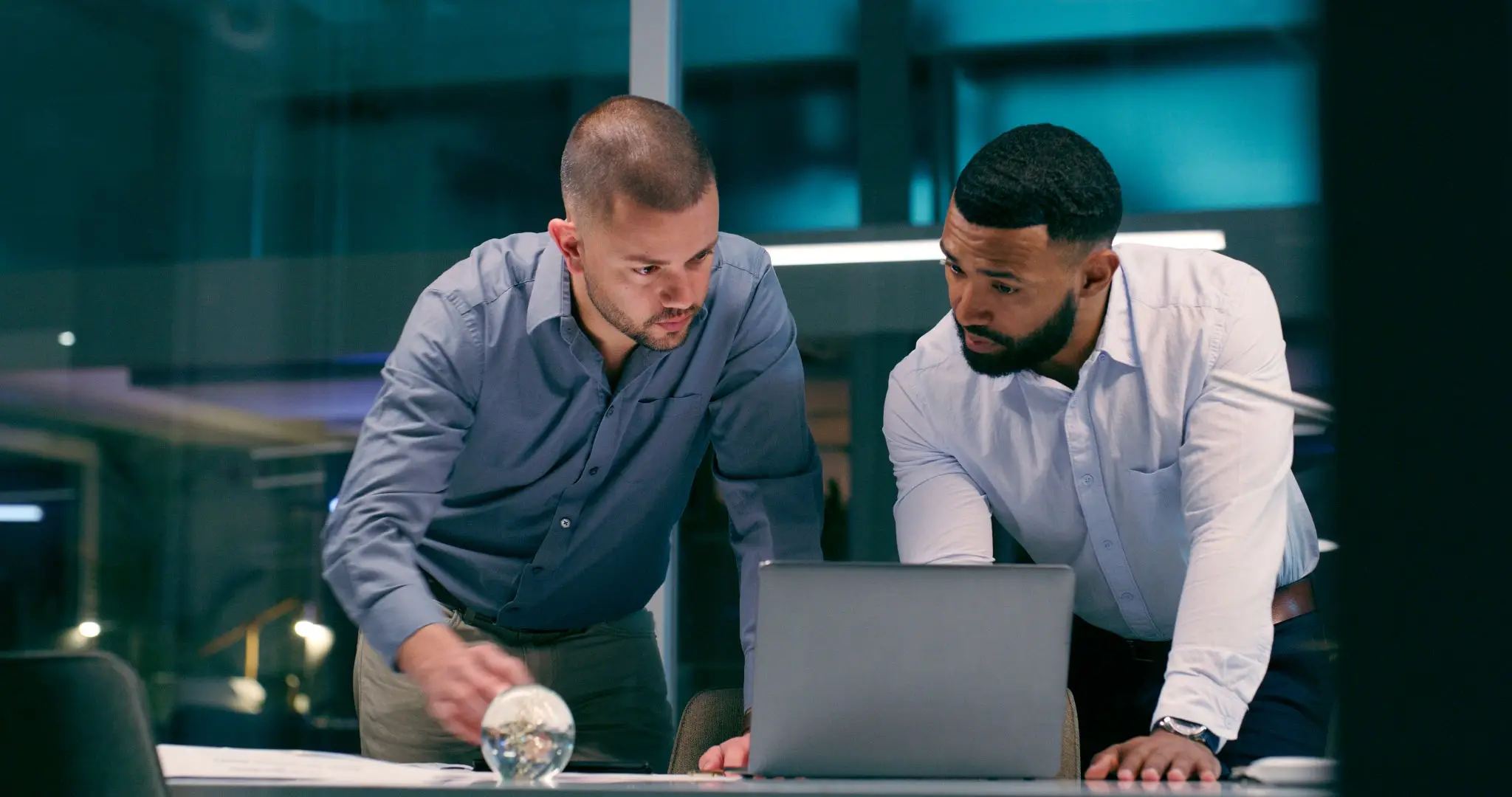 Business meeting with laptop discussion